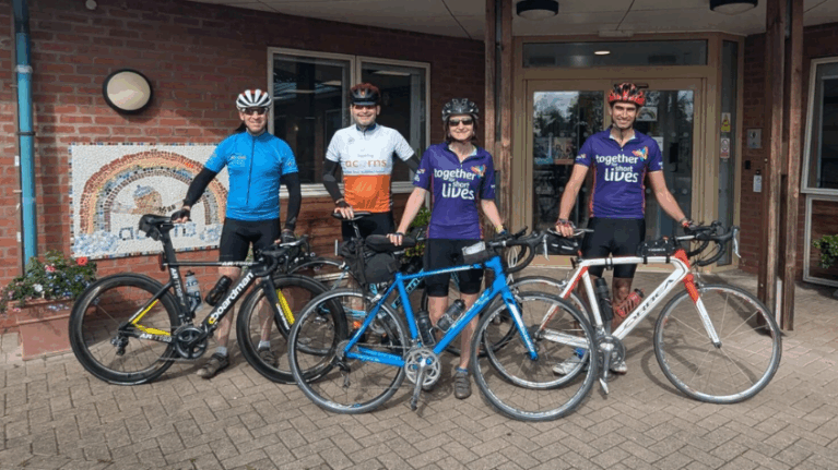 Cyclists outside a children's hospice