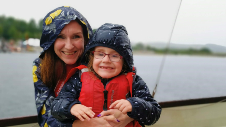 Mary and her mum on a boat
